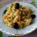 Rice with Carrots and Pickles in a Wok Pan