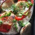 Baked Silver Carp with Tomatoes and Onions