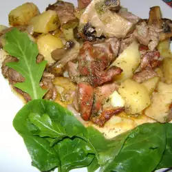 Shank with Potatoes and Mushrooms in a Clay Pot