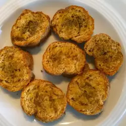 Homemade Bruschettas with Garlic, Butter, Mixed Herbs and Salt