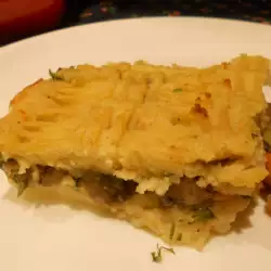 Pastel de patata relleno de champiñones