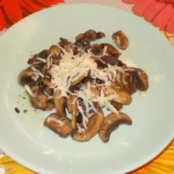 Royal Field Mushrooms with Butter and Yellow Cheese