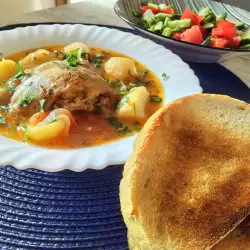 Chicken Stew with Onions and Tomatoes in a Multicooker