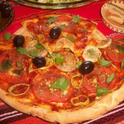 Vegan Pizza with Tomatoes, Olives and Basil