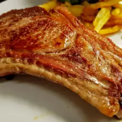 Beef Steaks with Butter on a Cast Iron Pan