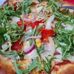 Vegan pizza met rucola