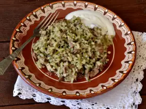 Cabeza de cordero con arroz y espinacas