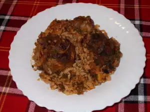 Pierna de cordero con arroz y vinagrera