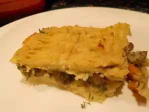 Pastel de patata relleno de champiñones