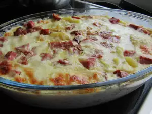 Oven-Baked Potatoes with Smoked Meat and Cream