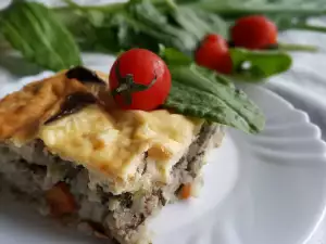 Moussaka mit Hähnchenmägen, Leber und Reis