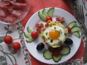 Spaghetti muffins met prosciutto en gedroogde tomaten