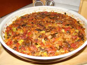 Caracoles al horno con calabacín y arroz