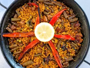 Paella met varkensvlees en verse tuinbonen