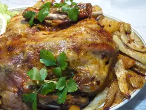 Ganze Ente mit Kartoffeln im Ofen