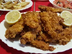 Tapa de pollo rebozado con copos de maíz