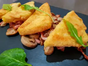 Panierte Polenta mit Pilzen und Speck