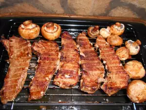 Filetes de cerdo a la parrilla en adobo de cerveza