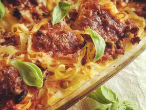 Tagliatelle de carne con tomate al horno