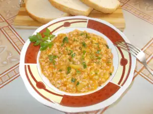 Calabacín con tomate y arroz