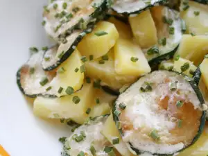 Potatoes with Zucchini and Eggplants in a Glass Cook Pot