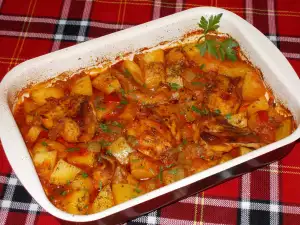 Conejo al horno con patatas y calabacines