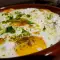 Huevos al horno con crema de espinacas