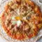 Pizza italiana con carne picada