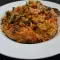 Arroz con alitas de pollo y tomate