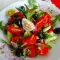 Colorful Salad with Radishes, Cherry Tomatoes and Dandelion Leaves