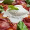 Pizza con burrata y prosciutto