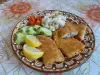 Сельдь в панировке с рисом и горошком