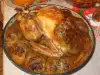 Stuffed Turkey on Top of Sauerkraut and Sarma