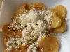 French Fries Cooked in Butter and with Feta Cheese on Top