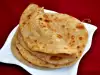 Pitas with Feta Cheese on a Clay Dish