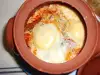 Feta Cheese with Tomatoes and Roast Peppers in a Clay Pot